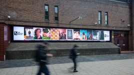 All artworks from ‘A Real Woman’ lined up on a digital billboard in Waterloo. The Gallery, Season 4, 2024. Produced by Artichoke. Image from the launch event, 10 July 2024. Photo by Yves Salmon